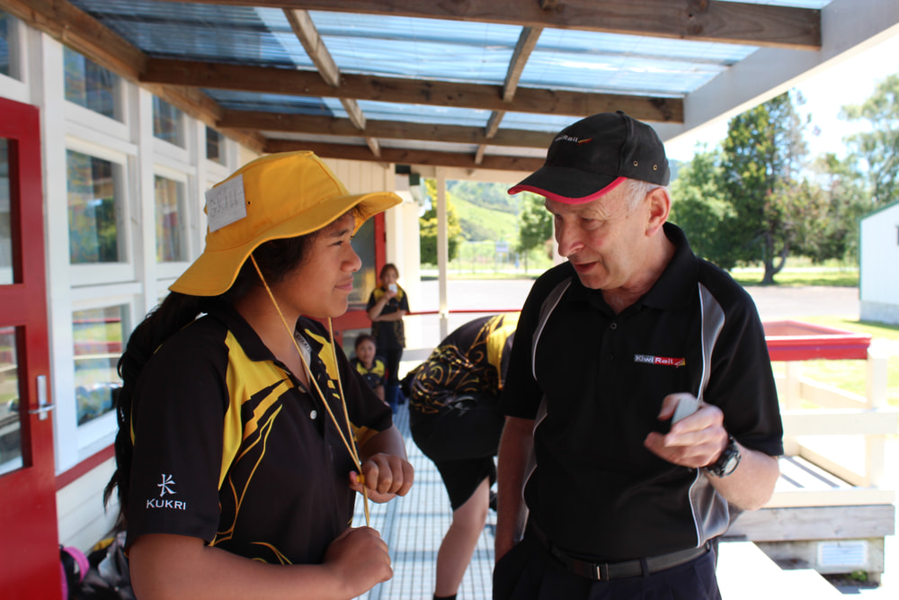 Train driver speaks with school student